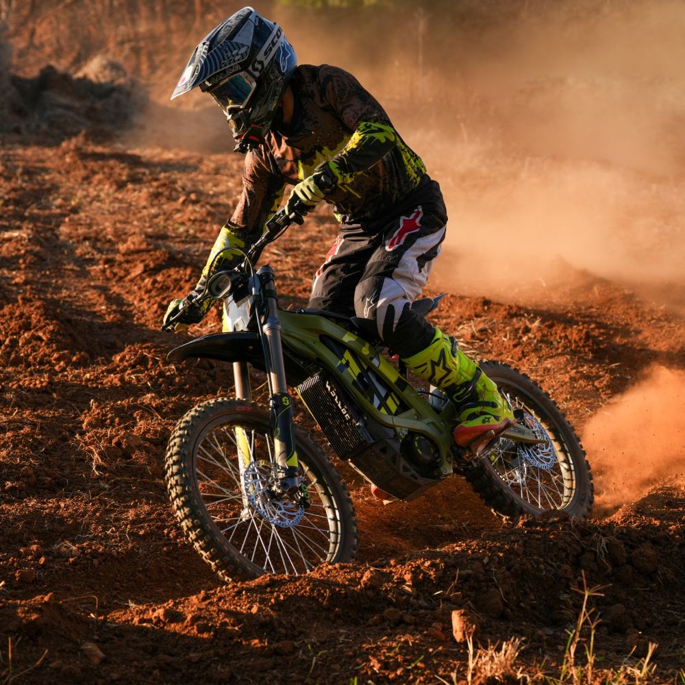 Surron Light Bee X jumping off road electric dirt bike high performance riding action