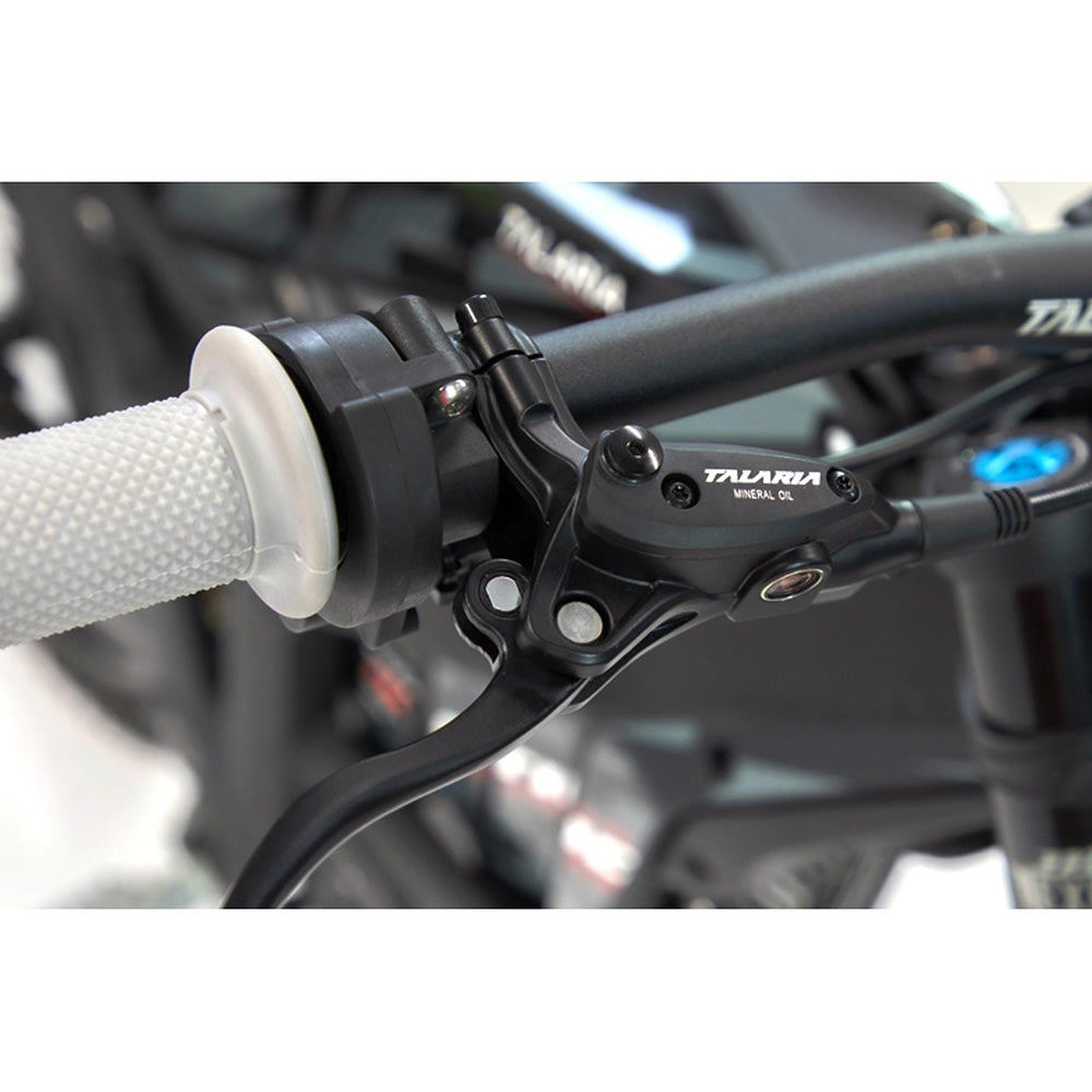 Close-up of Talaria STING handlebar with advanced brake system for precise control and smooth off-road riding experience