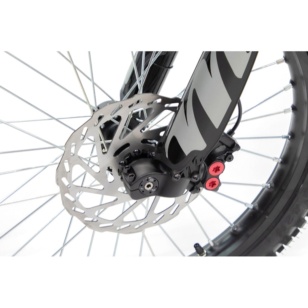 Talaria STING front brake rotor and caliper for precise braking, enhancing control and safety during off-road riding