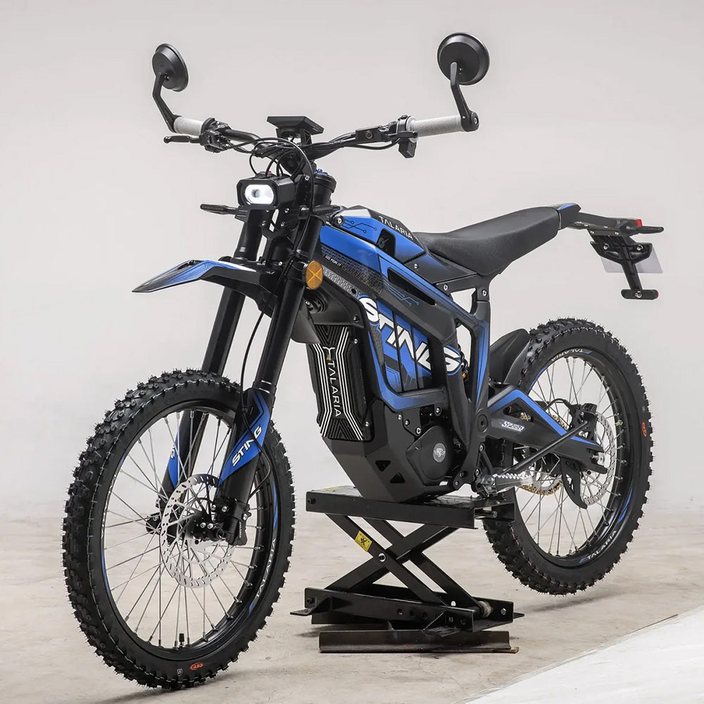 Front view of the Talaria Sting MX4 electric dirt bike, equipped with off-road tires and high-performance suspension for rugged terrains