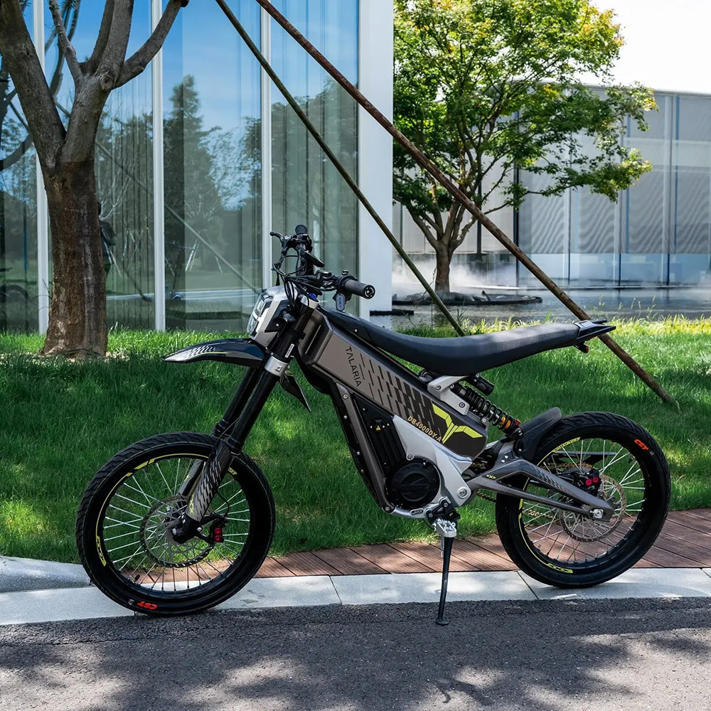 Talaria XXX electric dirt bike parked outdoors, highlighting its sleek design, robust frame, and high-performance features for urban and off-road riding